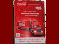 Das Plakat der Coca-Cola Weihnachtstrucktour in Köln-Mülheim
